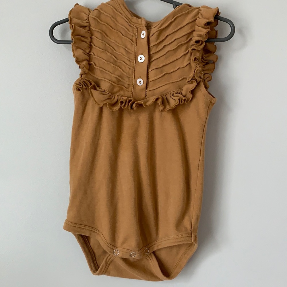 Kate Quinn ruffle onesie